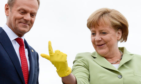 German Chancellor Merkel jokes with Poland's Prime Minister Tusk